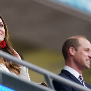 Le prince William, son épouse Kate Middleton et leur fils aîné le prince George lors de la finale de l'Euro 2020 au stade Wembley, à Londres, le 11 juillet 2021.