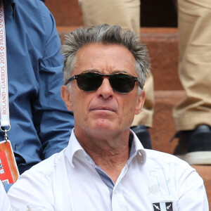 Gérard Holtz et sa femme Muriel Mayette - People dans les tribunes des Internationaux de France de tennis de Roland Garros à Paris.