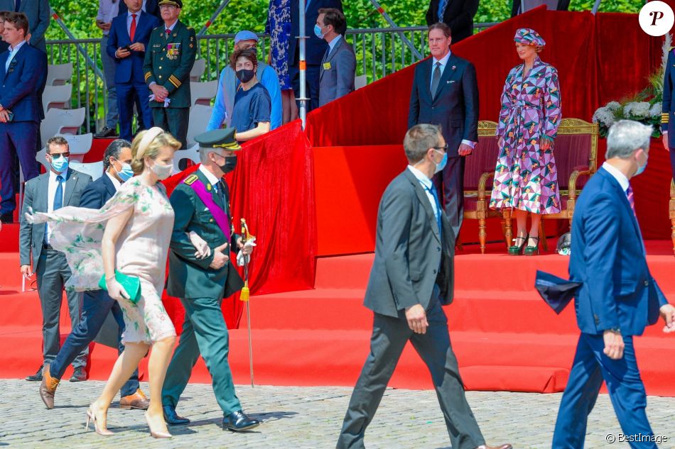 La princesse Delphine de Saxe Cobourg et son mari James O'Hare assistent à la Fête nationale belge, le 21 juillet 2021, en présence du roi Philippe et de la reine Mathilde de Belgique et du prince Laurent de Belgique.