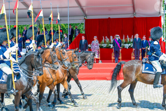 La princesse Delphine de Saxe Cobourg et son mari James O'Hare assistent à la Fête nationale belge, le 21 juillet 2021, en présence du roi Philippe et de la reine Mathilde de Belgique et du prince Laurent de Belgique.