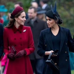 Kate Middleton, la duchesse de Cambridge et Meghan Markle, la duchesse de Sussex à la messe de Noël à l'église Sainte-Marie-Madeleine à Sandringha.