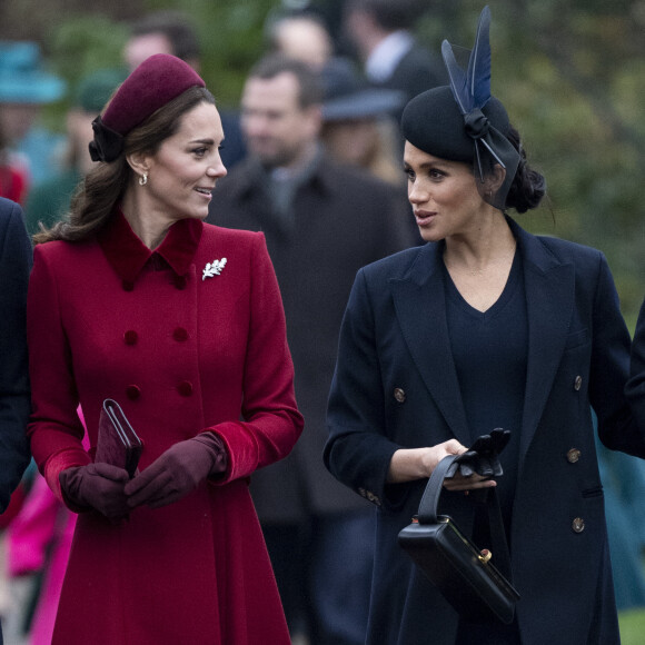 Kate Middleton, la duchesse de Cambridge et Meghan Markle, la duchesse de Sussex à la messe de Noël à l'église Sainte-Marie-Madeleine à Sandringha.