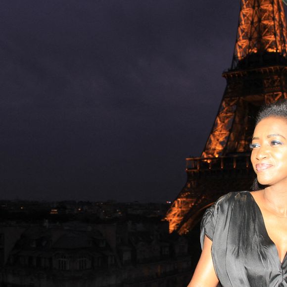 Exclusif - Hapsatou Sy et son mari Vincent Cerruti - Le Grand Dîner du 14 juillet, sur le rooftop de l'hôtel Pullman Tour Eiffel à Paris, France, le 14 juillet 2021. © Philippe Baldini/Bestimage