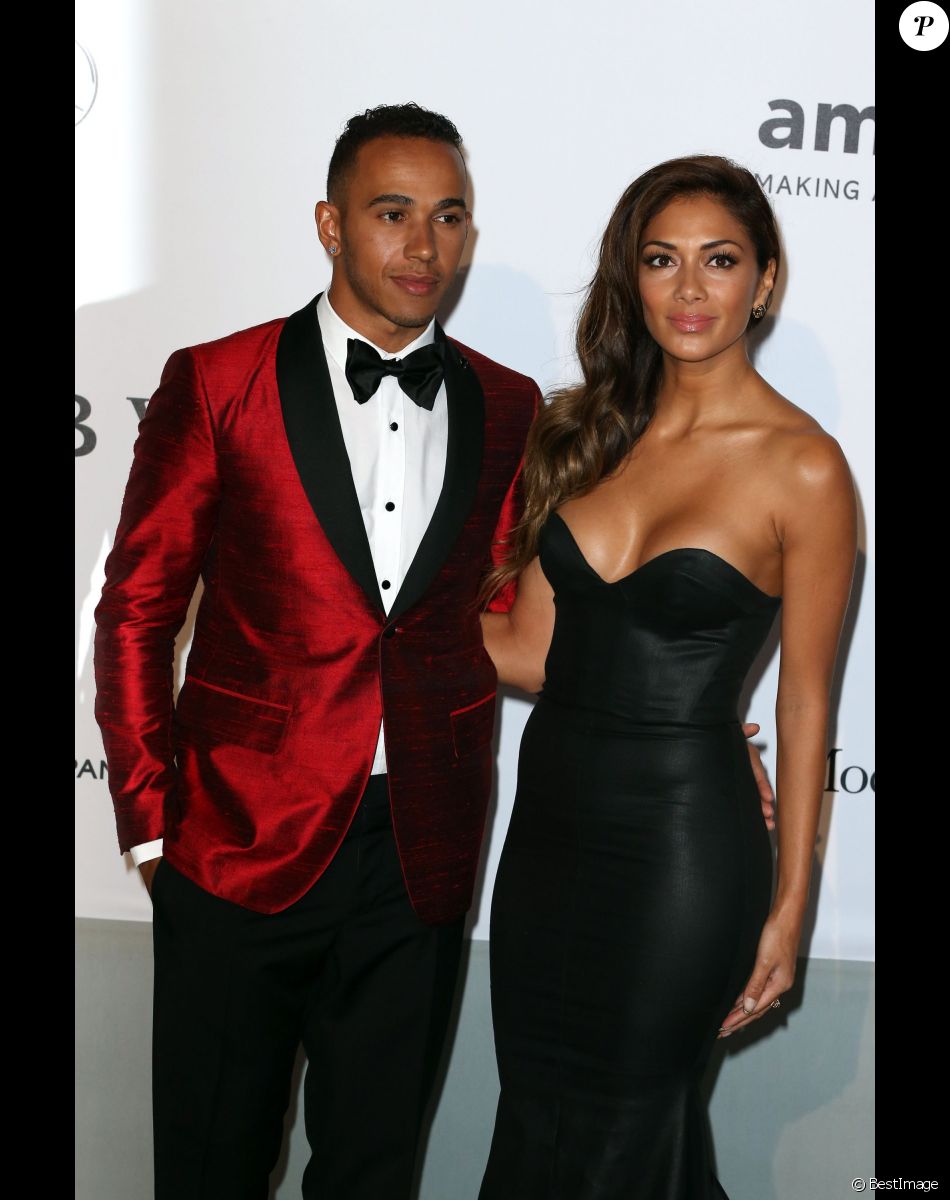 Lewis Hamilton et sa compagne Nicole Scherzinger - Photocall de la soirée "AmfAR's 21st Cinema Against AIDS" à l'Eden Roc au Cap d'Antibes lors du 67ème festival du film de Cannes, le 22 mai 2014.