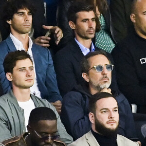 Gad Elmaleh et son fils Noë, Gims et Vegedream assistent au match de football opposant le PSG à l'Olympique Lyonnais au Parc des Princes. Paris, le 19 septembre 2021. © JB Autissier/Panoramic/Bestimage
