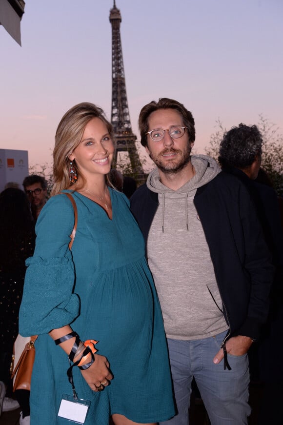 Exclusif - Ophélie Meunier (enceinte) et son mari Mathieu Vergne - Soirée Orange au restaurant du café de l'homme à Paris.  © Rachid Bellak/Bestimage 