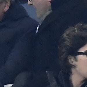 Pascal Obispo et son fils Sean dans les tribunes du Stade de France. Le 20 novembre 2018. © Cyril Moreau/Bestimage