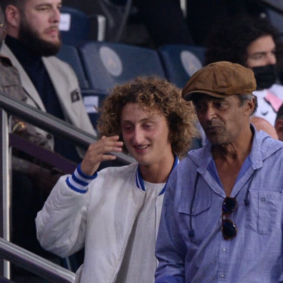 Yannick Noah et son fils Joalukas - People en tribunes du match de football en ligue 1 Uber Eats : Le PSG (Paris Saint-Germain) remporte la victoire 2-1 contre Lyon au Parc des Princes à Paris le 19 septembre 2021.