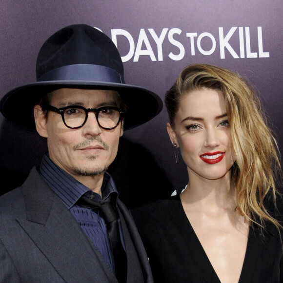Johnny Depp et sa fiancée Amber Heard - Première du film "3 Days to Kill" à Hollywood, le 12 février 2014.