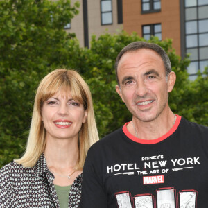 Nikos Aliagas avec sa femme Tina Grigoriou - Photocall à l'occasion de l'inauguration du nouveau Disney's Hotel New York - The Art of Marvel à Disneyland Paris le 26 juin 2021. © Guirec Coadic / Bestimage 