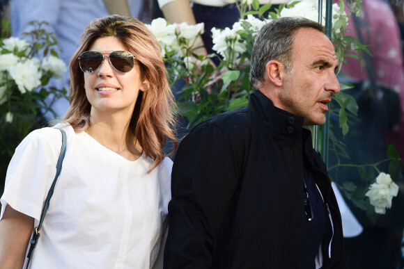 Nikos Aliagas et sa femme Tina dans les tribunes lors des internationaux de tennis de Roland Garros à Paris, France, le 31 mai 2019. © Jean-Baptiste Autissier/Panoramic/Bestimage 