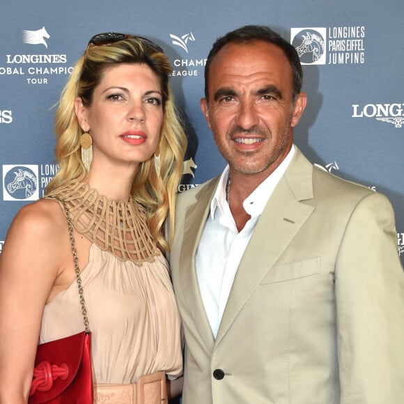 Exclusif - Nikos Aliagas et sa compagne Tina Grigoriou - Photocall du Longines Paris Eiffel Jumping au Champ de Mars à Paris. ©Veeren-Perusseau/Bestimage 