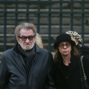 Eddy Mitchell et sa femme Muriel - Sorties de l'église de la Madeleine après les obsèques de Johnny Hallyday à Paris - Le 9 décembre 2017 