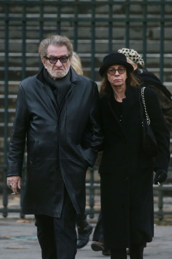 Eddy Mitchell et sa femme Muriel - Sorties de l'église de la Madeleine après les obsèques de Johnny Hallyday à Paris - Le 9 décembre 2017 