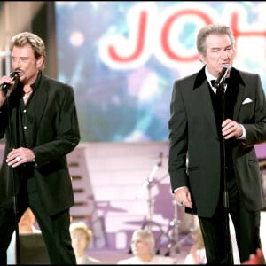 Johnny Hallyday et Eddy Mitchell lors de l'émission "Les disques d'or".