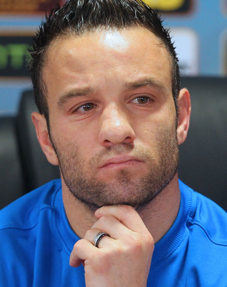 Mathieu Valbuena, milieu de terrain du Dynamo de Moscou, donne une conférence de presse en compagnie de son entraineur Stanislav Cherchesov, avant la rencontre des 32ème de finale contre Anderlecht, le 25 février 2015 à Moscou