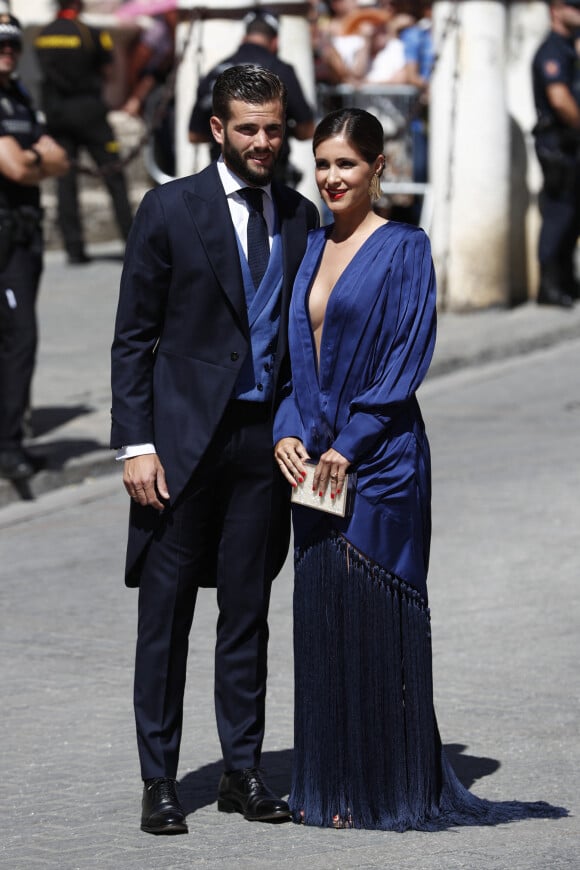Nacho Fernandez et son épouse assistent au mariage de Sergio Ramos et Pilar Rubio à Séville, le 15 juin 2019.