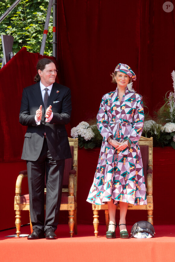 La princesse Delphine de Belgique et son compagnon Jim O'Hare - La famille royale de Belgique assiste au défilé militaire à Bruxelles, à l'occasion de la fête Nationale belge. Belgique, Bruxelles, 21 juillet 2021.