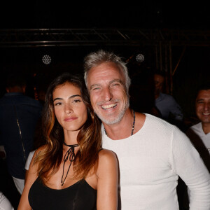 Exclusif - David Ginola et sa nouvelle et jeune compagne Maeva Denat - Soirée de la Summer Party des 50 ans du Byblos et des Caves du Roy à Saint-Tropez le 23 juillet 2017. © Rachid Bellak/Bestimage