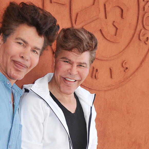 Igor et Grichka Bogdanov au village des Internationaux de France de tennis de Roland-Garros à Paris, le 6 juin 2014.