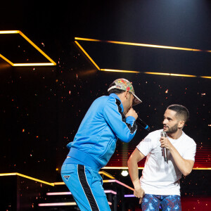 Exclusif - Malik Bentalha et Heuss L'Enfoiré au spectacle de Malik Bentalha "Encore" au Dome de Paris. Le 20 février 2020. © Cyril Moreau/Bestimage