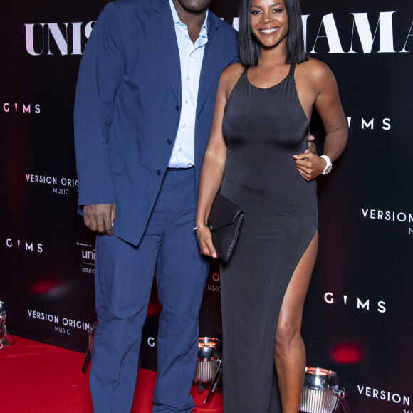 Teddy Riner et sa femme Luthna Plocus au photocall de la soirée "Unis comme jamais" au profit de l'Unicef, au pavillon Cambon à Paris. Le 8 novembre 2021. © Pierre Perusseau / Bestimage