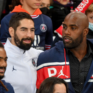 Teddy Riner, Nikola Karabatic - Le PSG bat Angers (2-1) lors du match de Ligue 1 Uber Eats à Paris, le 15 octobre 2021. © Lionel Urman / Panoramic / Bestimage