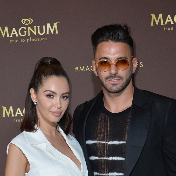 Nabilla Benattia (enceinte) et son mari Thomas Vergara au photocall de l'after party "Magnum x Rita Ora" sur la plage privée Magnum lors du 72ème Festival International du Film de Cannes, France,le 16 mai 2019. © Veeren/Bestimage