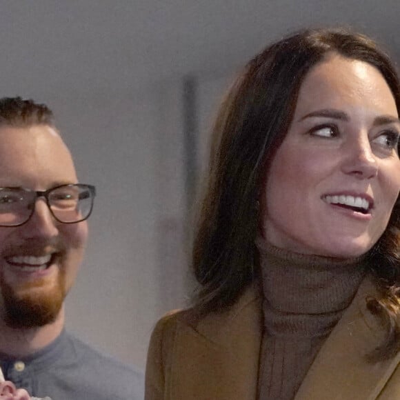 Catherine (Kate) Middleton, duchesse de Cambridge, rencontre des bénévoles de l'Eglise "Church on The Street" à Burnley, le 20 janvier 2022. 