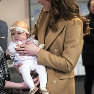 Le prince William, duc de Cambridge, et Catherine (Kate) Middleton, duchesse de Cambridge, rencontrent des bénévoles de l'Eglise "Church on The Street" à Burnley, le 20 janvier 2022. 