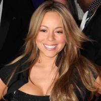 Une très sensuelle Mariah Carey entourée de... Clint Eastwood, Morgan Freeman et Quentin Tarantino !