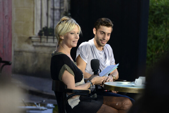 Marwan Berreni (acteur dans la serie "Plus Belle la Vie") - Rebecca Hampton sur un plateau lors de la Foire Internationale de Marseille, le 30 septembre 2013.
