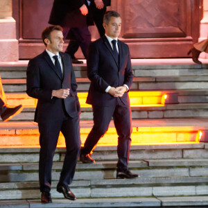 Le président Emmanuel Macron, accompagné par Gérald Darmanin, ministre de l'Intérieur, intervient lors d'une réunion informelle des ministres de l'Intérieur de l'union européenne à Tourcoing dans le Nord le 2 février 2022.