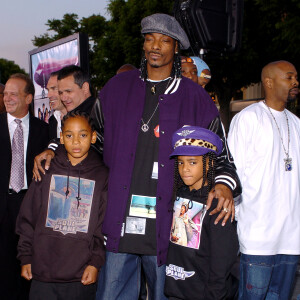 Snoop Dogg et ses fils Cordé (à gauche) et Cordell (à droite) à Los Angeles, en mai 2004.