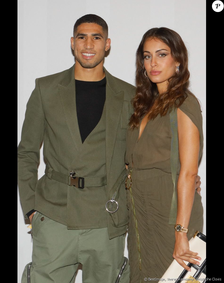 Achraf Hakimi et sa compagne Hiba Abouk - Photocall du défilé de mode Femmes prêt-à-porter printemps-été 2022 "Balmain" à la Seine Musicale à Paris. Le 29 septembre 2021 © Veeren Ramsamy-Christophe Clovis / Bestimage