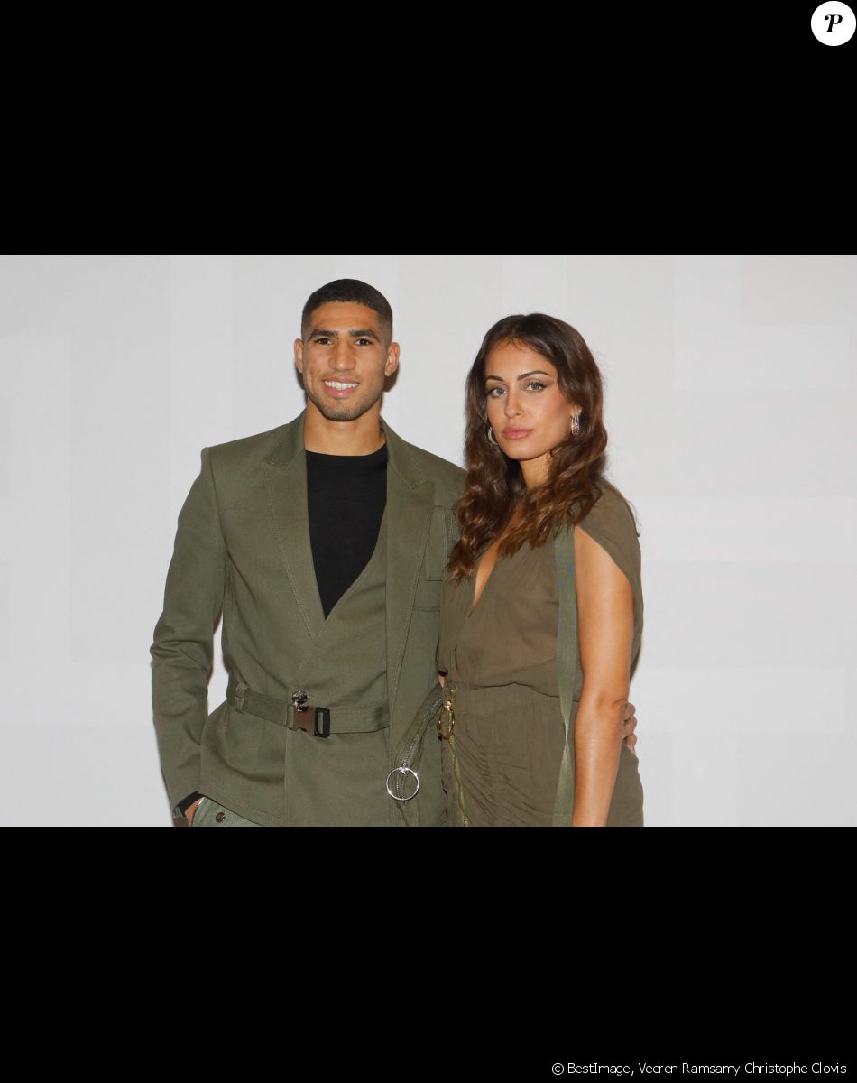 Achraf Hakimi et sa compagne Hiba Abouk - Photocall du défilé de mode Femmes prêt-à-porter printemps-été 2022 "Balmain" à la Seine Musicale à Paris. Le 29 septembre 2021 © Veeren Ramsamy-Christophe Clovis / Bestimage