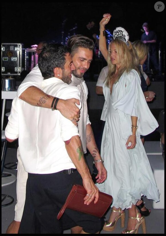 Marc Jacobs et son chéri Lorenzo Martone, à l'occasion du réveillon du jour de l'an donné par Roman Abramovich dans sa villa de Saint-Barthelemy, le 31 décembre 2009.
