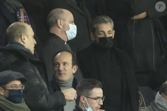 Jean-Michel Blanquer et Nicolas Sarkozy - People lors de la huitième de finale aller de la Ligue des champions entre le PSG et le Real Madrid au Parc des Princes à Paris le 15 février 2022