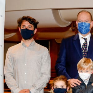 Le réalisateur Rémy Masséglia, le prince Albert II de Monaco, Olivier Wenden, CEO de la fondation Prince Albert II, Naïs, le prince héréditaire Jacques de Monaco, la princesse Gabriella - Le prince Albert II de Monaco assiste à la première du film "Naïs au pays des loups" avec ses enfants à Monaco le 14 décembre 2021. Le film est soutenu par la fondation Prince Albert II © Claudia Albuquerque / Bestimage  SH Prince Albert II of Monaco, HSH Prince Jacques and HSH Princess Gabriella attend the Premiere of "Naïs au pays des loups" presented by the Prince Albert II Foundation, directed by Rémy Masseglia and starring her daughter Naïs. In Monaco on December 14, 2021. 