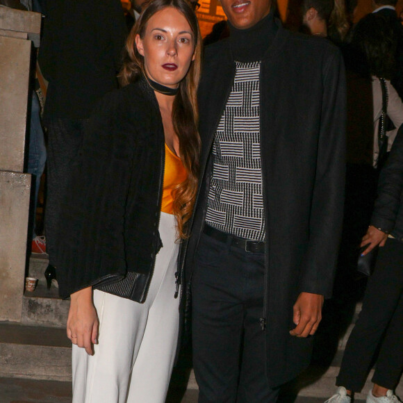 Le chanteur Stromae et sa femme Coralie Barbier - Défilé de mode "Kenzo" collection prêt-à-porter Printemps-Eté 2017 lors de la Fashion Week de Paris à la Cité de l'architecture et du patrimoine au Trocadéro à Paris, France, le 4 octobre 2016. © Agence/Bestimage 