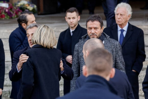 Nicolas Sarkozy, Bernard Montiel - Sorties des obsèques de Jean-Pierre Pernaut en la Basilique Sainte-Clotilde à Paris le 9 mars 2022. © Cyril Moreau/Bestimage 