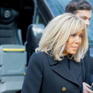 Brigitte Macron - Sorties des obsèques de Jean-Pierre Pernaut en la Basilique Sainte-Clotilde à Paris le 9 mars 2022. © Christophe Clovis / Bestimage