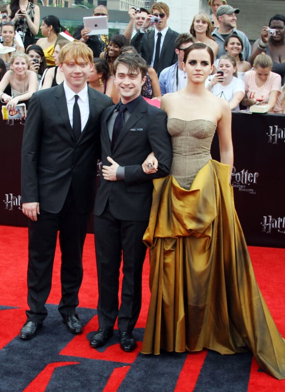 Rupert Grint, Daniel Radcliffe et Emma Watson à la première du film "Harry Potter et les Reliques de la mort : partie 2" à New York, en 2011.