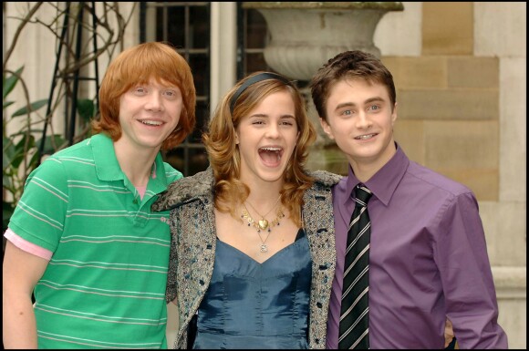 Rupert Grint, Emma Watson et Daniel Radcliffe au photocall du film "Harry Potter et la coupe de feu". Londres, le 25 octobre 2005.