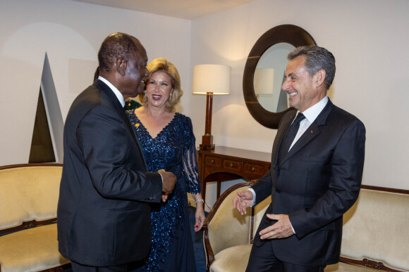 Exclusif - Alassane Ouattara, Dominique Ouattara et Nicolas Sarkozy - Dîner gala de l'association "Children of Africa" à Abidjan, le 11 mars 2022. © Olivier Borde / Bestimage