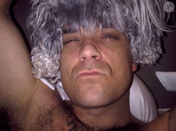Robbie Williams et ses perruques...