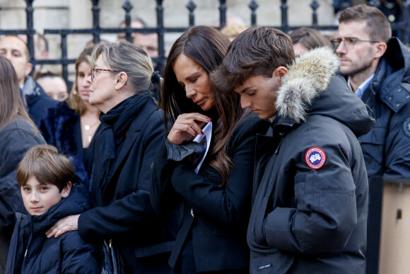 Nathalie Marquay et son fils Tom - La famille de Jean-Pierre Pernaut à la sortie des obsèques en la Basilique Sainte-Clotilde à Paris le 9 mars 2022. © Cyril Moreau/Bestimage