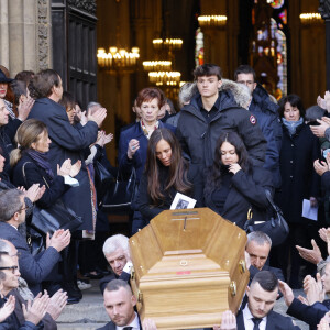 Nathalie Marquay et ses enfants Lou et Tom, guest - La famille de Jean-Pierre Pernaut à la sortie des obsèques en la Basilique Sainte-Clotilde à Paris le 9 mars 2022. © Cyril Moreau/Bestimage