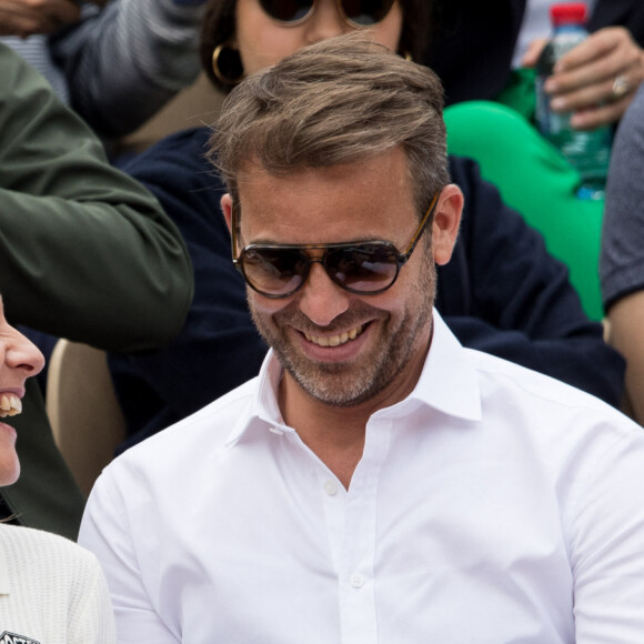 Shirley Bousquet et son compagnon Charles Watinet dans les tribunes des Internationaux de France de Tennis de Roland-Garros à Paris, le 29 mai 2019. © Jacovides-Moreau/Bestimage