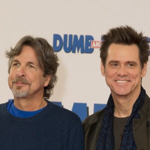 Peter Farrelly et Jim Carrey - Photocall du film "Dumb and Dumber" à l'hôtel Connaught à Londres. Le 20 novembre 2014 